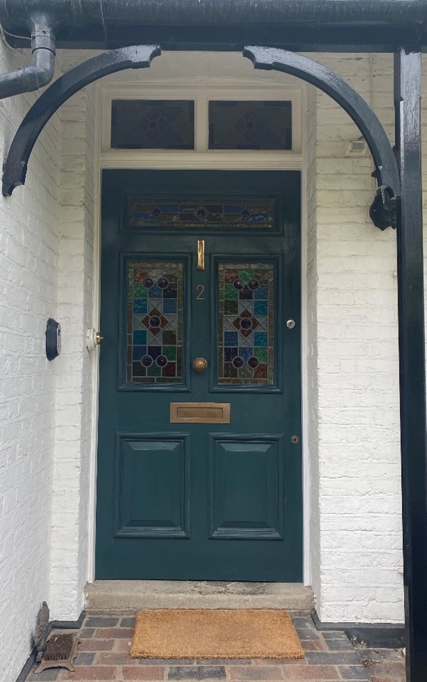 Figure 202 A Replacement door at 2 Ormond Avenue which carefully replicated the original pattern of the stained glass