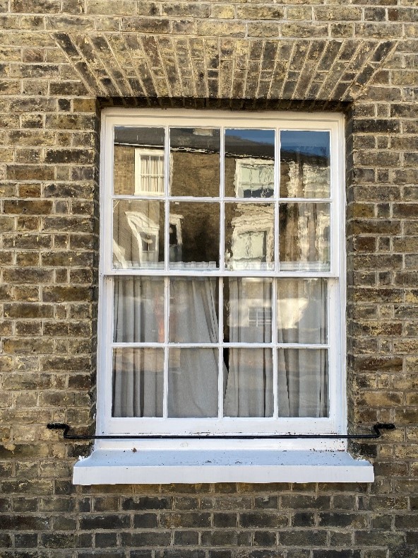Figure 195 Timber sash window in Michel's Place