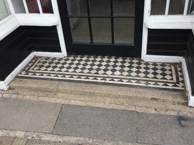 Figure 54: Surviving tiled entrance step to no.71 Sheen Lane