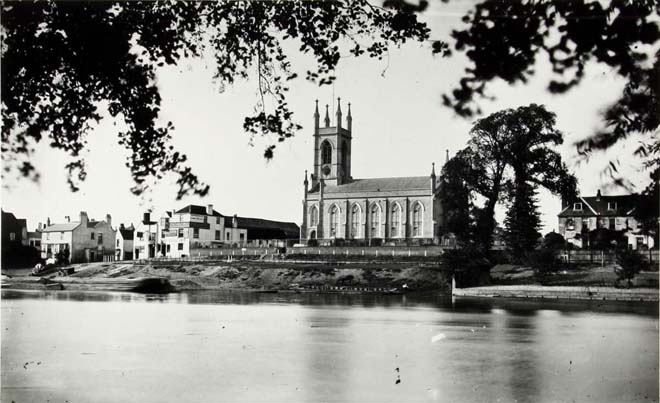Figure 10: A view of St Mary's Church from across the Thames in the late 19th century, before the fire at The Bell public house in 1892
