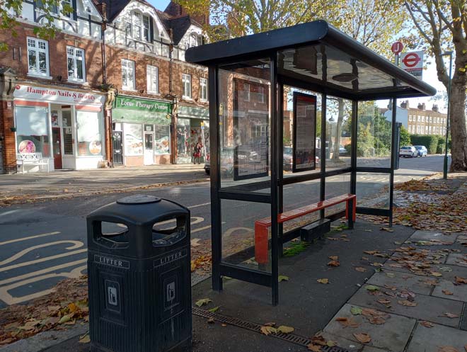 Figure 124: Bus stop and bin on Station Road, typical of the street furniture found elsewhere in the Conservation Area
