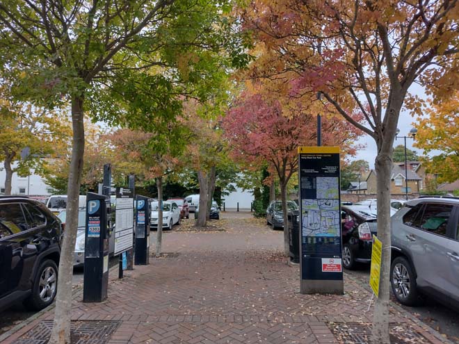 Fig. 52: A paved pedestrian foot path and mature trees breaks up the openness of a typical car park and allow access through