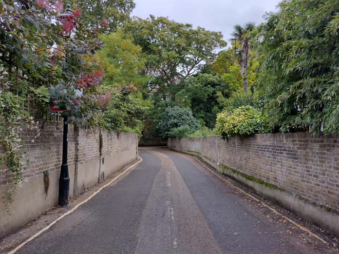 Fig. 97: Riverside heading east, the entrance to Marble Hill branches off at the end