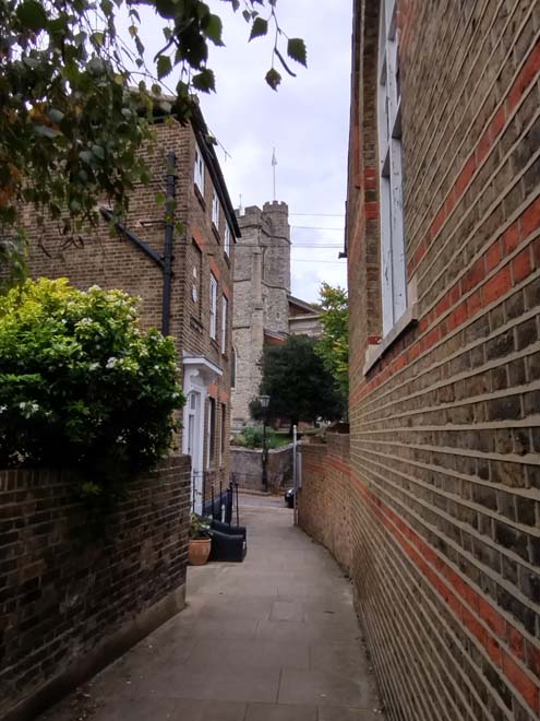 Fig. 93: Narrow alley with view of the church