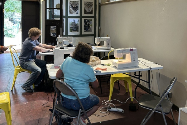 Residents stitch, learn and connect with TRAID at The Fixery